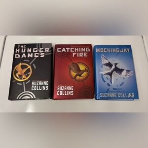 The Hunger Games, Catching Fire and Mockingjay hardcover books